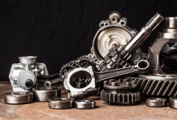 Car parts on a table.